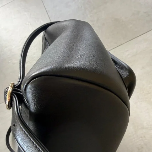 CHANEL Black Quilted Backpack with Gold Accents - Picture 6 of 9